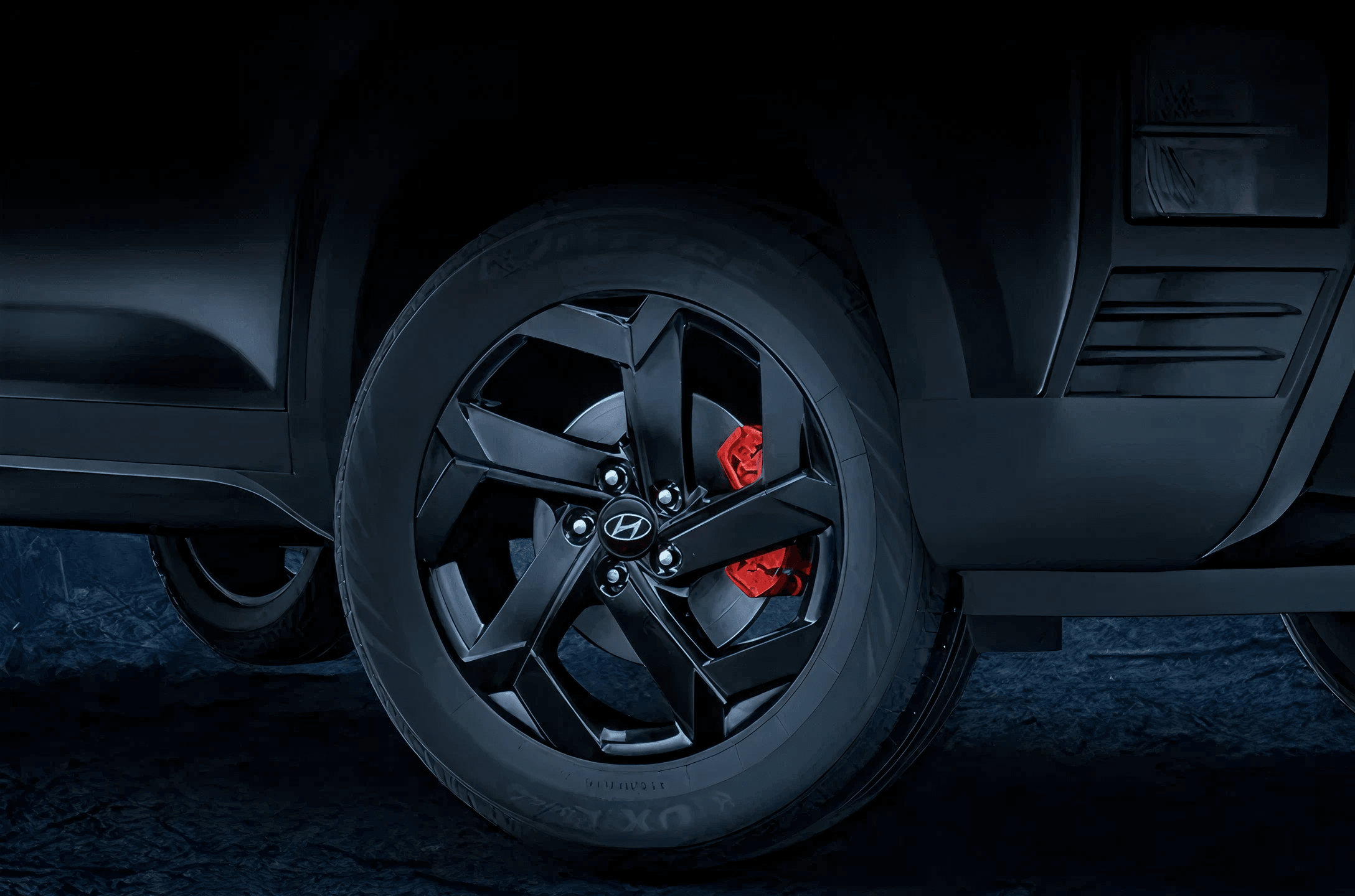 Black alloys with red calipers
