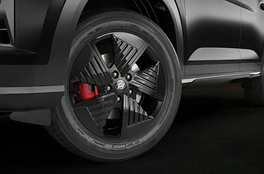 R17 Black alloy wheels with red brake callipers