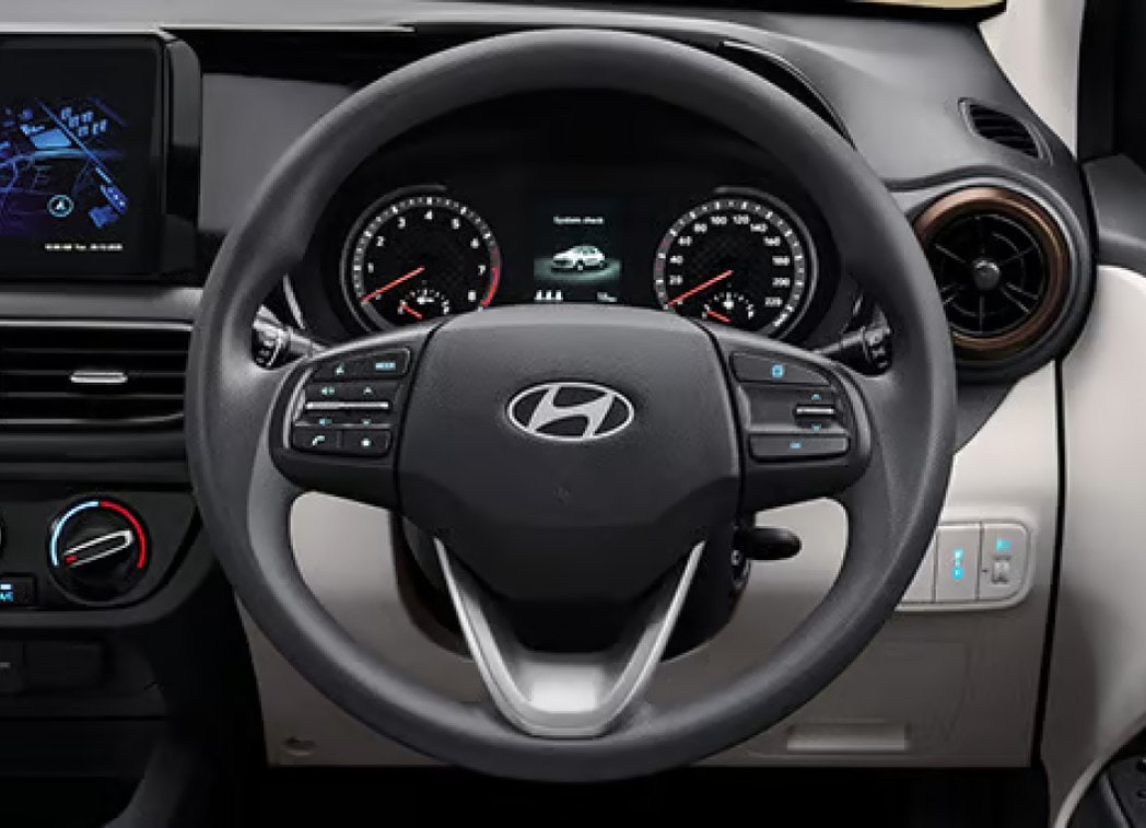 Steering wheel mounted control